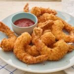TAIL OF BREADED GARLIC SHRIMPS